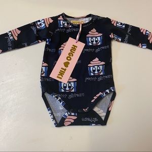 Hugo Loves Tiki onesie